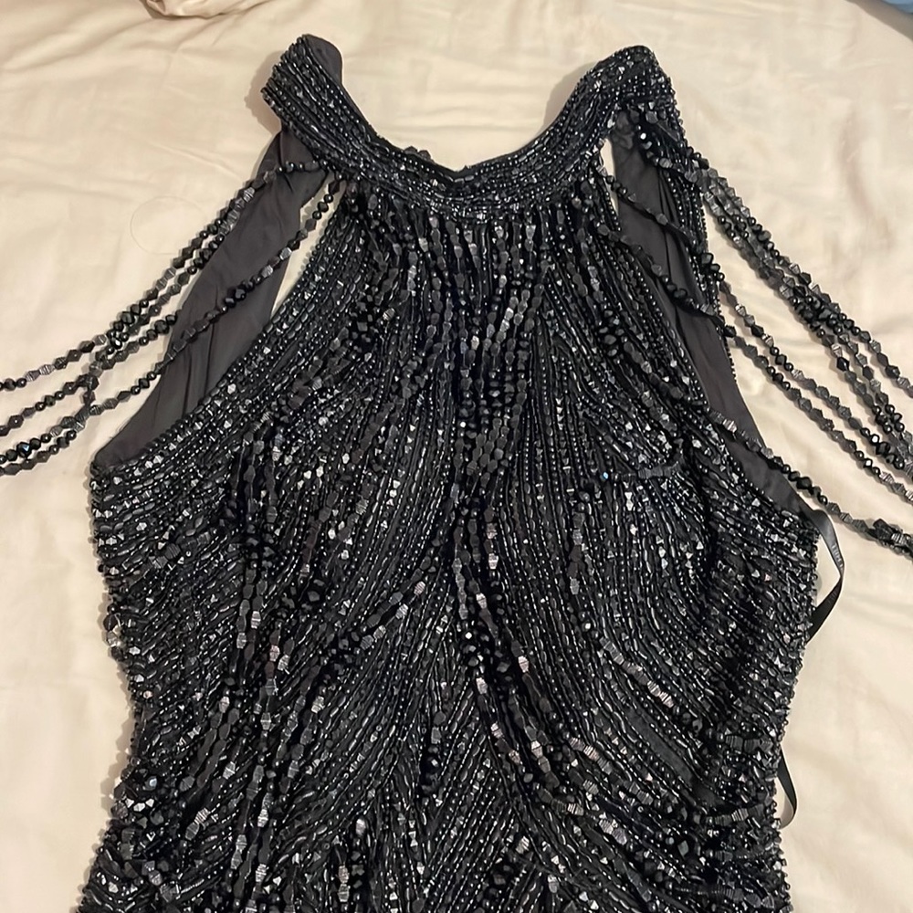 Black beaded Sherri Hill dress. Size 10 but I’m a size 6 stretchy material